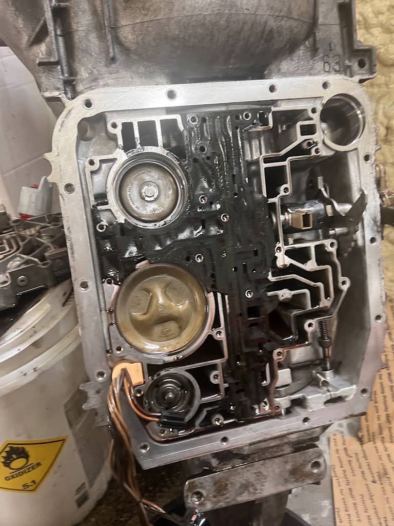 Opened transmission case with internal components visible